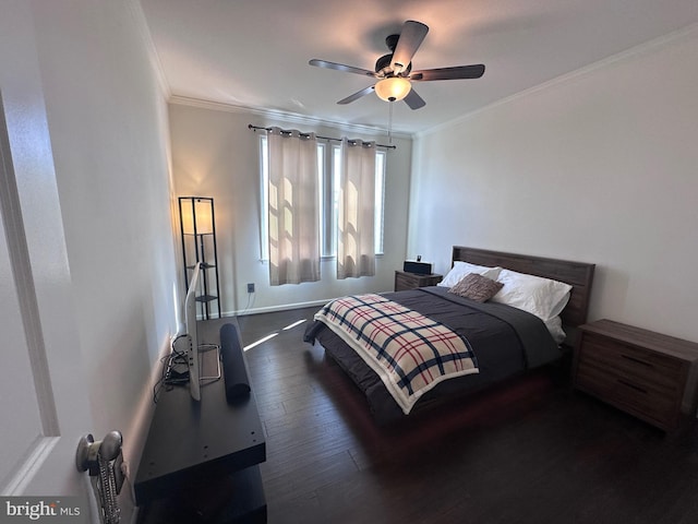 bedroom featuring baseboards, dark wood-style floors, a ceiling fan, and ornamental molding