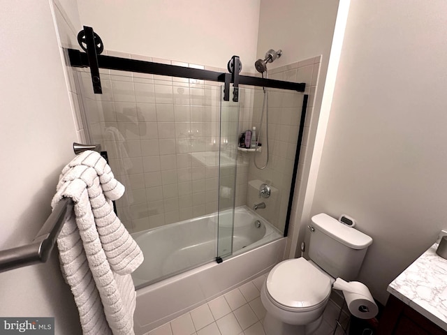 bathroom with vanity, toilet, tile patterned flooring, and shower / bath combination with glass door