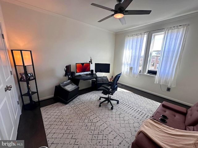 office area with wood finished floors, a ceiling fan, baseboards, and ornamental molding