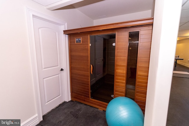 exercise room with a sauna