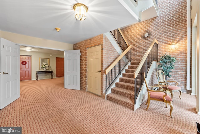 508 Limerick Cir Unit 304, Lutherville Timonium, MD 21093 - staircase with carpet and brick wall