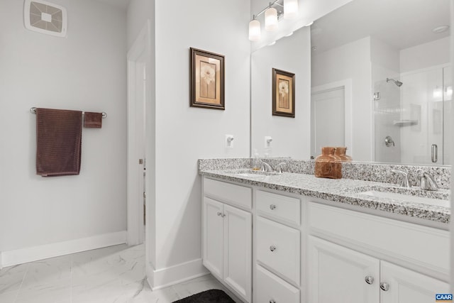 full bathroom with marble finish floor, visible vents, a sink, and a stall shower