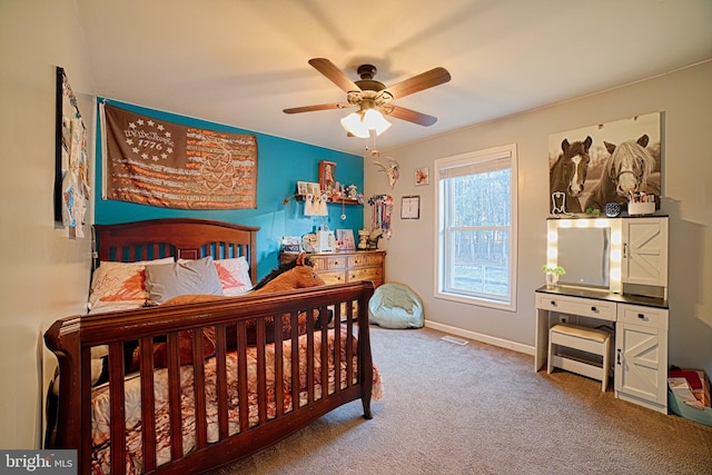 bedroom featuring carpet floors, ceiling fan, and baseboards