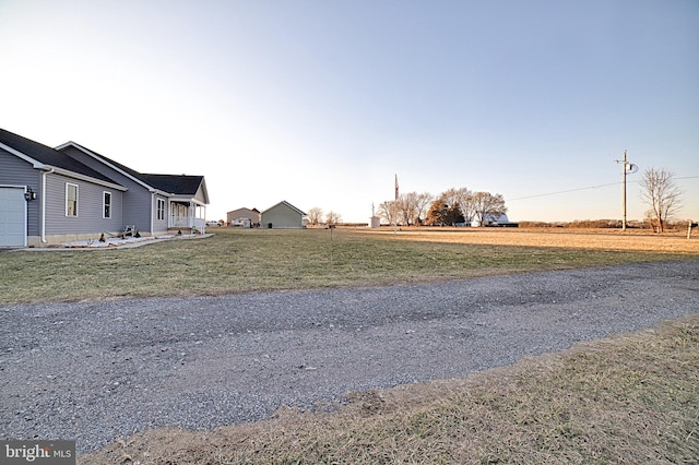 view of yard with a garage