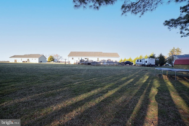 view of yard featuring a trampoline