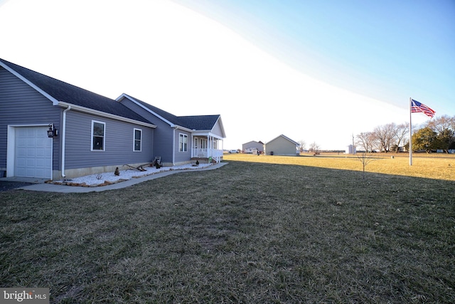 view of yard with an attached garage