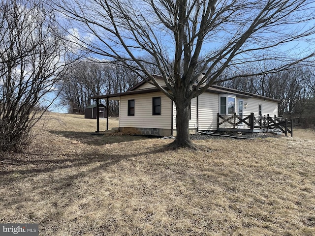 view of home's exterior featuring a deck