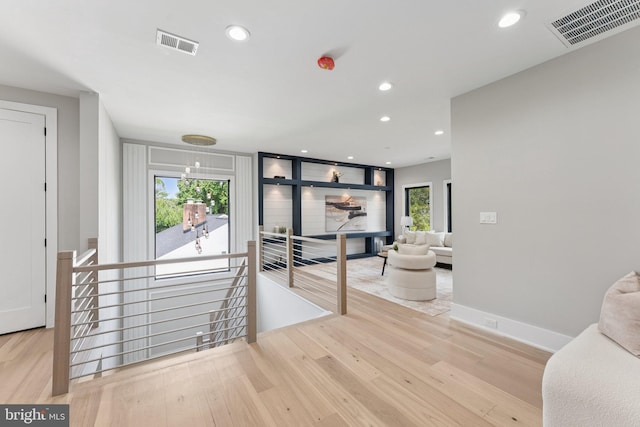 6935 Southridge Dr, Mclean, VA 22101 - living area with wood finished floors, recessed lighting, healthy amount of natural light, and baseboards