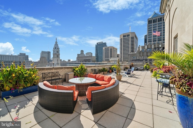 view of patio / terrace featuring a city view