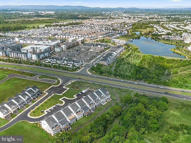 aerial view with a residential view and a water view