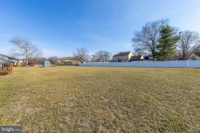 view of yard with fence