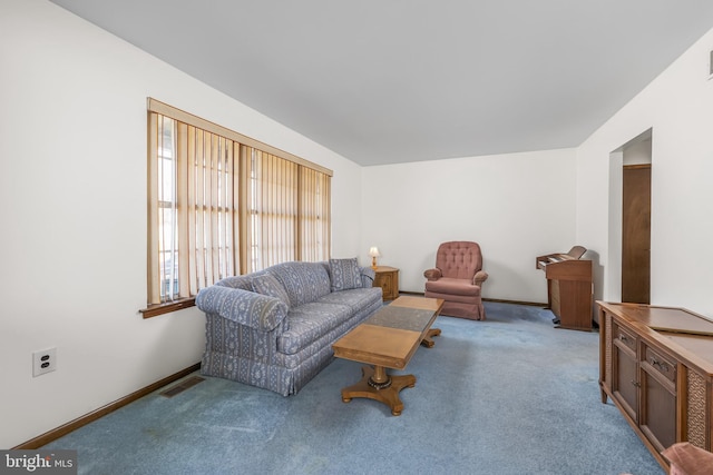 living room with carpet flooring, visible vents, and baseboards