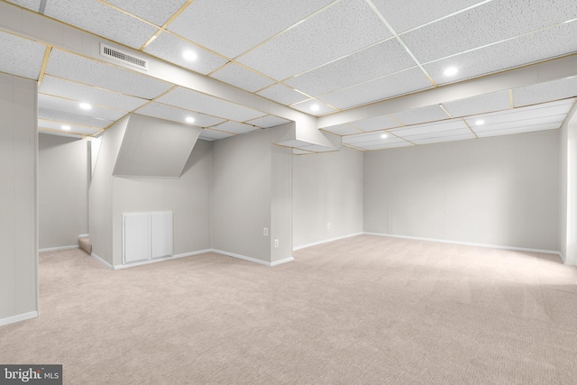 finished basement with carpet floors, recessed lighting, visible vents, and baseboards