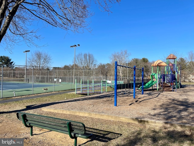 community jungle gym with fence