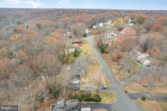 bird's eye view featuring a view of trees