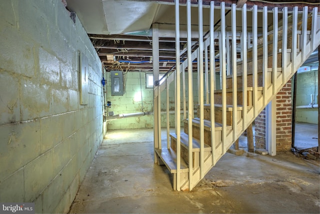 unfinished basement with electric panel