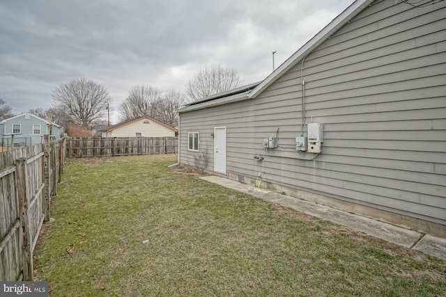 view of yard featuring a fenced backyard