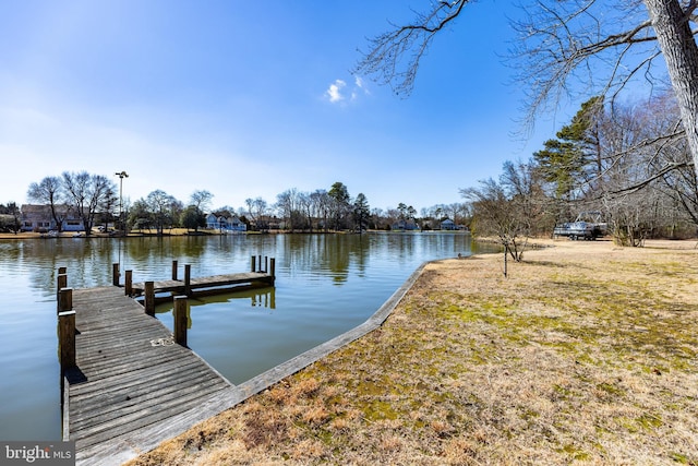 view of dock with a water view