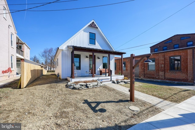 view of front of house featuring covered porch and board and batten siding