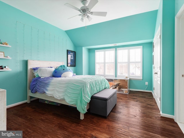 bedroom with vaulted ceiling, ceiling fan, wood finished floors, and baseboards