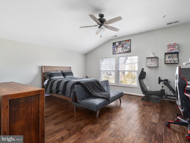 bedroom featuring lofted ceiling, visible vents, ceiling fan, and hardwood / wood-style floors