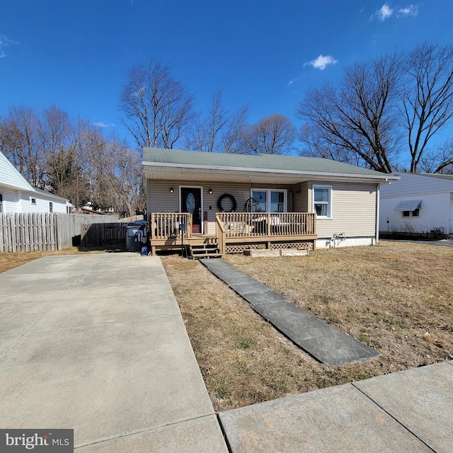 view of front of property featuring fence