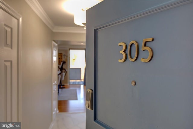 hallway with crown molding