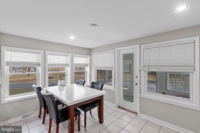 dining space featuring light tile patterned floors, visible vents, baseboards, and recessed lighting