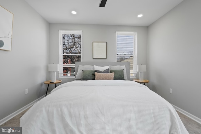 bedroom with carpet floors, recessed lighting, a ceiling fan, and baseboards