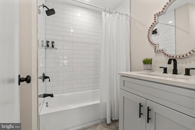 bathroom featuring vanity and shower / tub combo