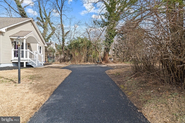 view of home's exterior featuring aphalt driveway