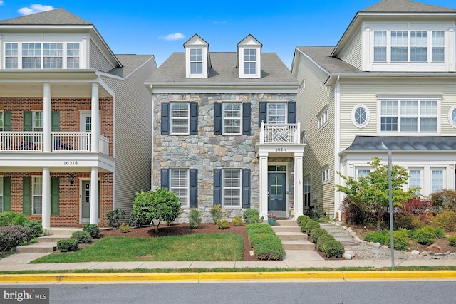 view of property featuring stone siding