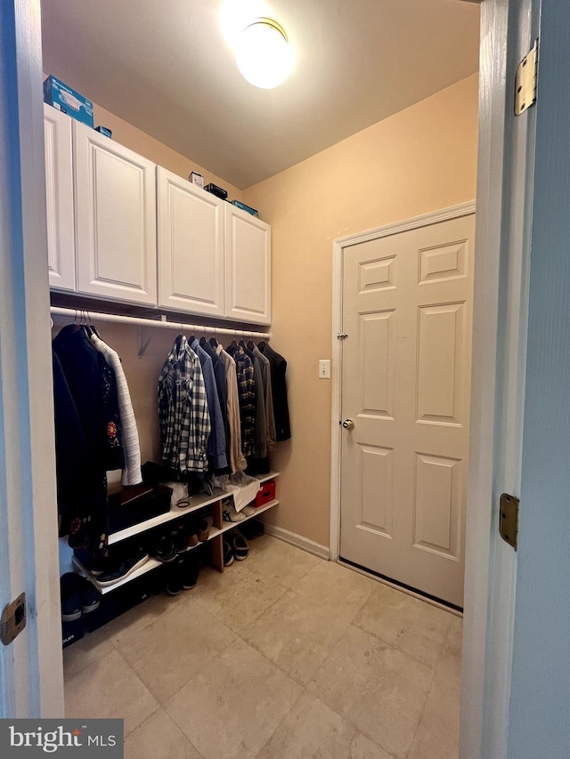 mudroom featuring baseboards