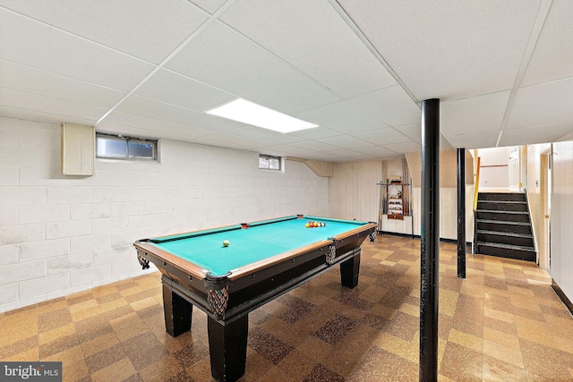 game room with pool table, a drop ceiling, and tile patterned floors