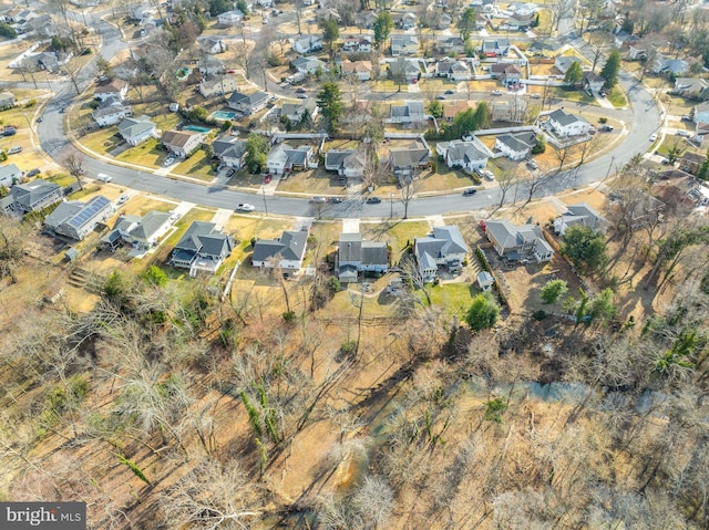 birds eye view of property with a residential view