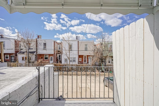 balcony featuring a residential view