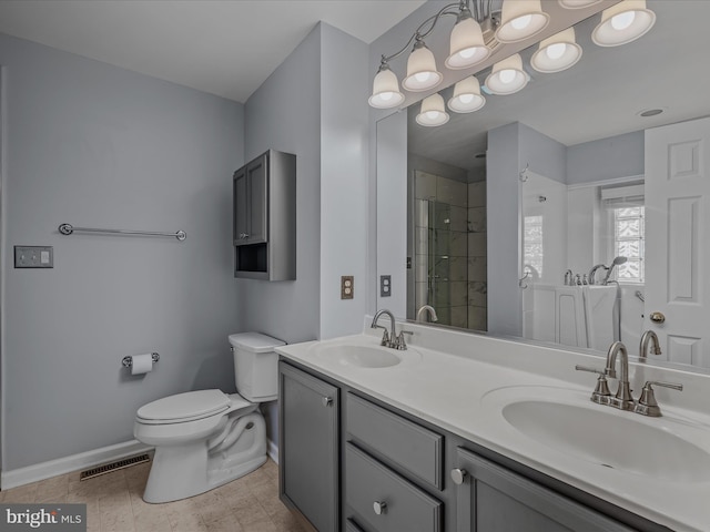 full bathroom featuring visible vents, a sink, toilet, and baseboards