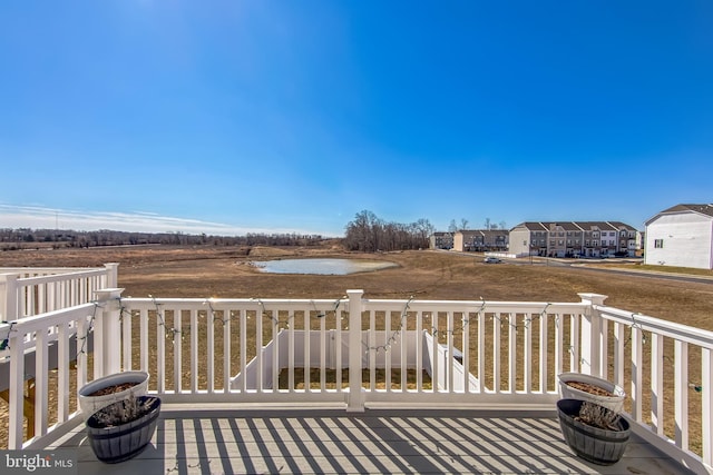 wooden deck with a residential view