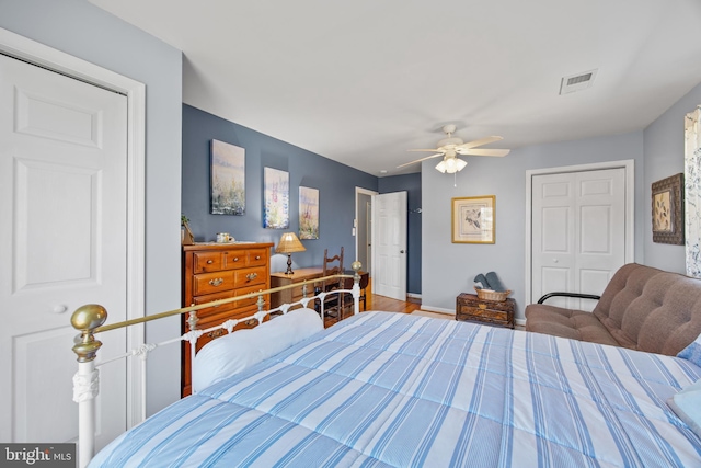 bedroom featuring a ceiling fan, visible vents, a closet, and baseboards