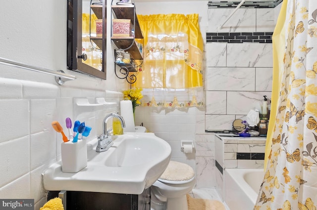 4103 Parkwood Ave, Baltimore, MD 21206 - full bath with toilet, marble finish floor, vanity, and tile walls