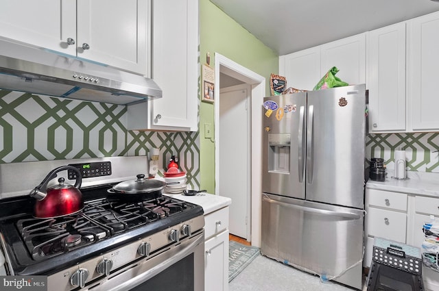 4103 Parkwood Ave, Baltimore, MD 21206 - kitchen featuring tasteful backsplash, light countertops, appliances with stainless steel finishes, under cabinet range hood, and white cabinetry
