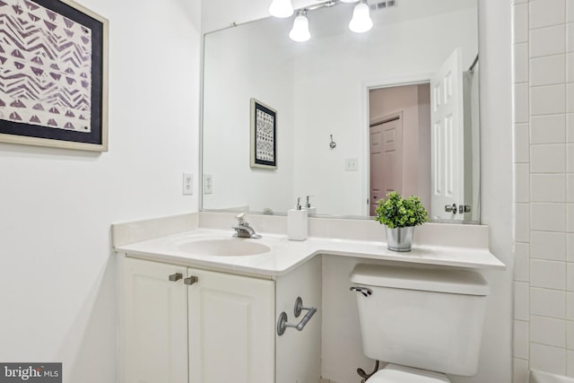 full bath featuring toilet, visible vents, vanity, a shower, and a bath