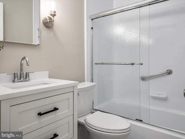 full bath featuring vanity and toilet