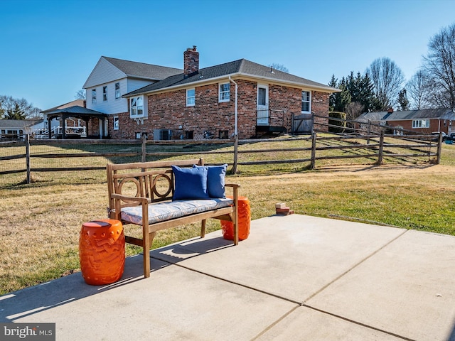 exterior space with a gazebo and fence