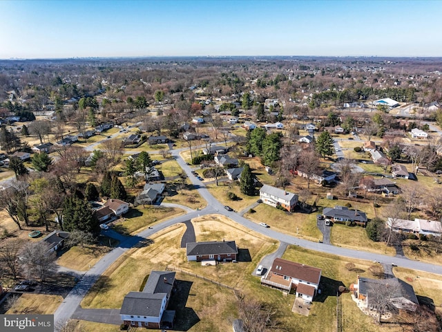 birds eye view of property with a residential view