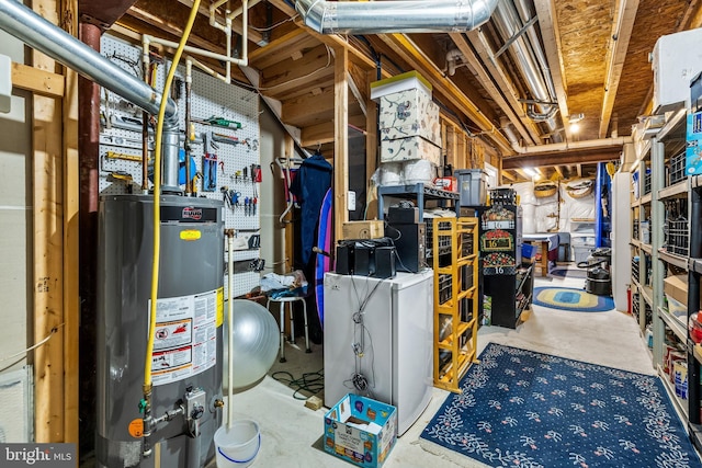 unfinished basement with gas water heater