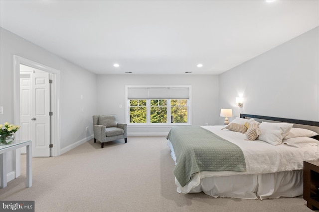 carpeted bedroom with recessed lighting and baseboards