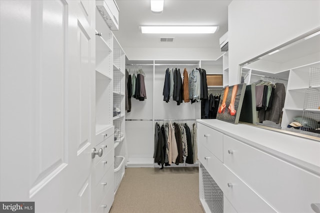 walk in closet with visible vents