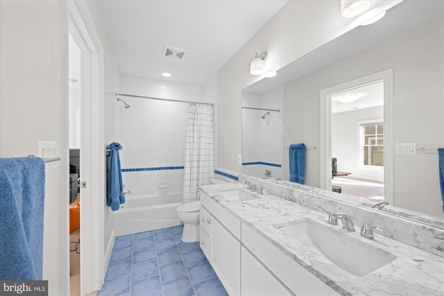 bathroom featuring double vanity, toilet, shower / tub combo, and a sink