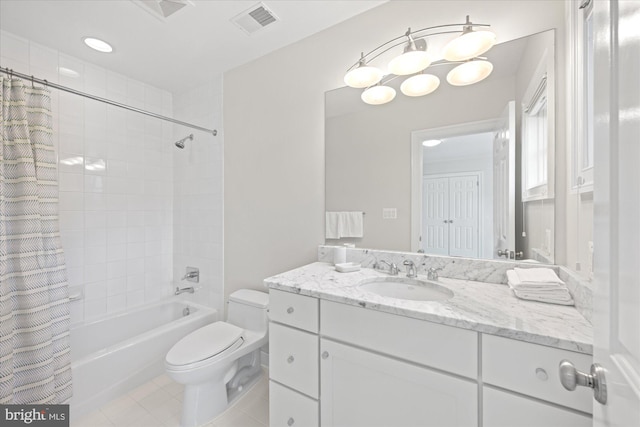 bathroom with visible vents, toilet, shower / tub combo with curtain, tile patterned floors, and vanity